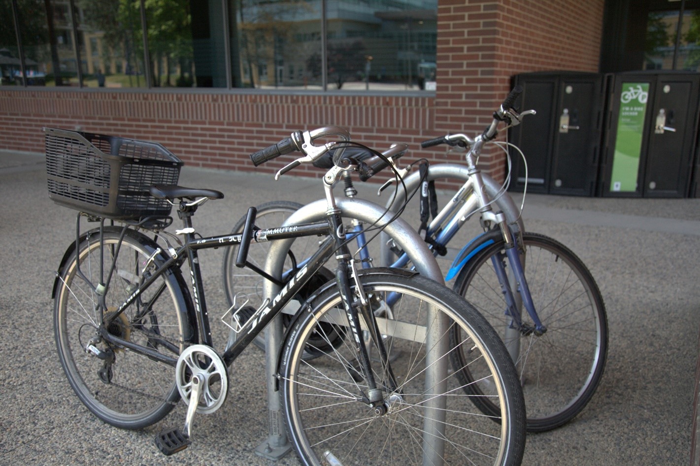 Bikes locked to outdoor bike lock outside ADM building